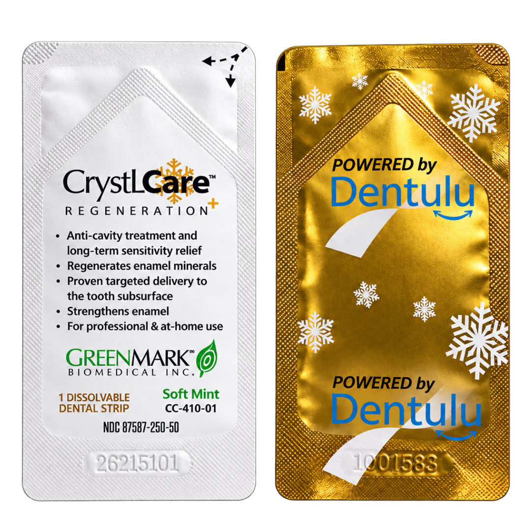 Two dental treatment single-use packets shown side by side on a plain white background. The left packet is white with black and green text reading 'CrystCare Regeneration' and 'GreenMark Biomedical Inc.