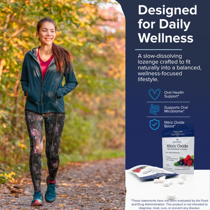 A woman walking on a forest path wearing a teal zip-up jacket and patterned leggings, beside a product panel that reads 'Designed for Daily Wellness' and shows a Nitric Oxide supplement package and loose tablets.